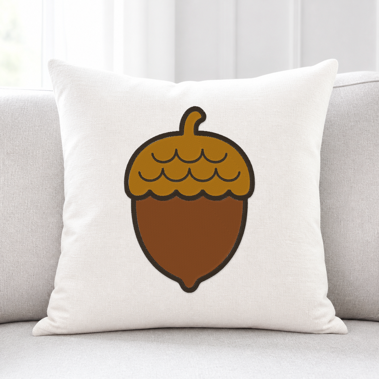 Autumn Acorn machine embroidery design on pillow