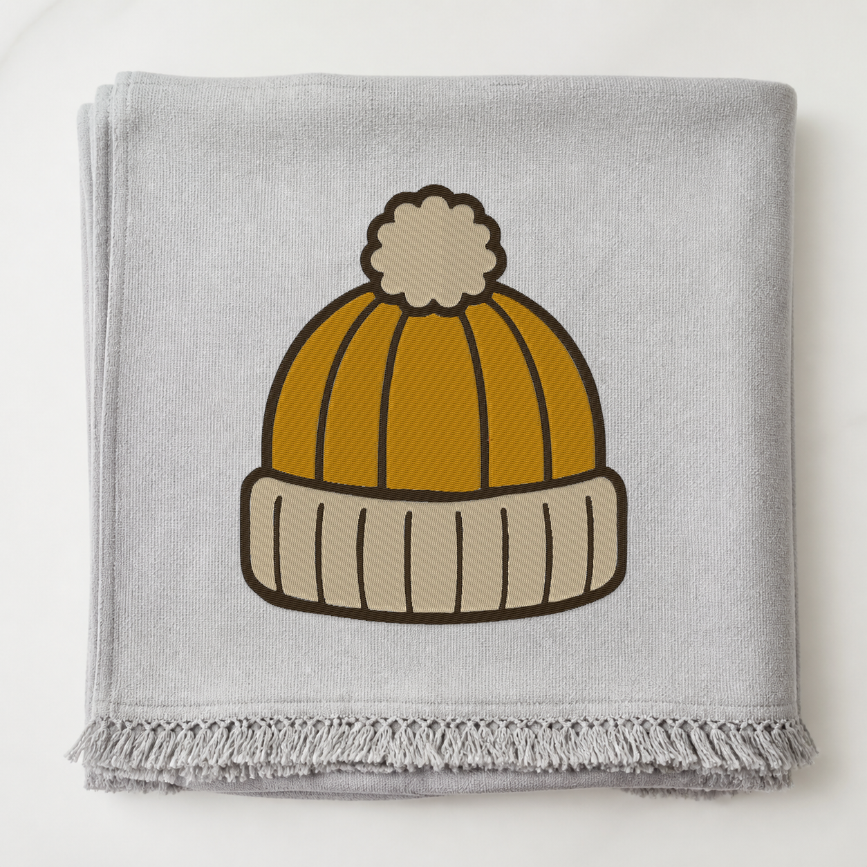 Autumn Knit Beanie machine embroidery design on blanket