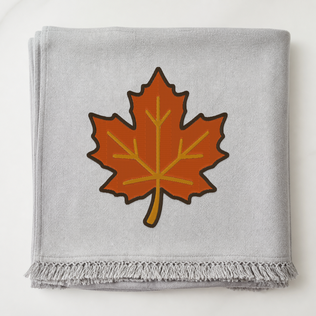 Autumn Maple Leaf machine embroidery design on blanket