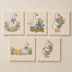 All five Goose Garden machine embroidery designs shown together on individual linen swatches